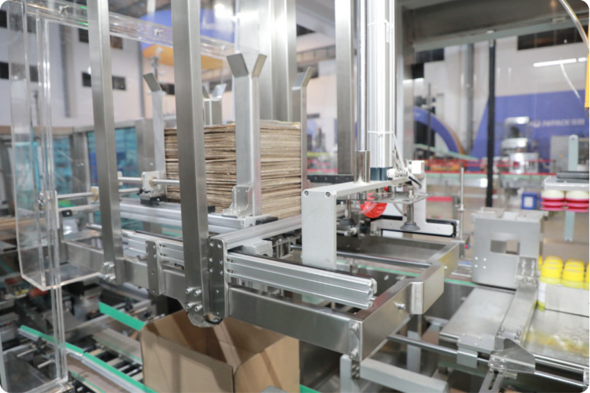 6-12 Cartoni/Min KZJ-2AH Macchina di imballaggio per cartoni a manipolatore automatico completo 380V 5.5KW
