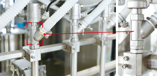 Macchina di riempimento liquido a pistoni dotata di sistema di riempimento servomotore e controllo PLC per una produzione di imballaggio coerente